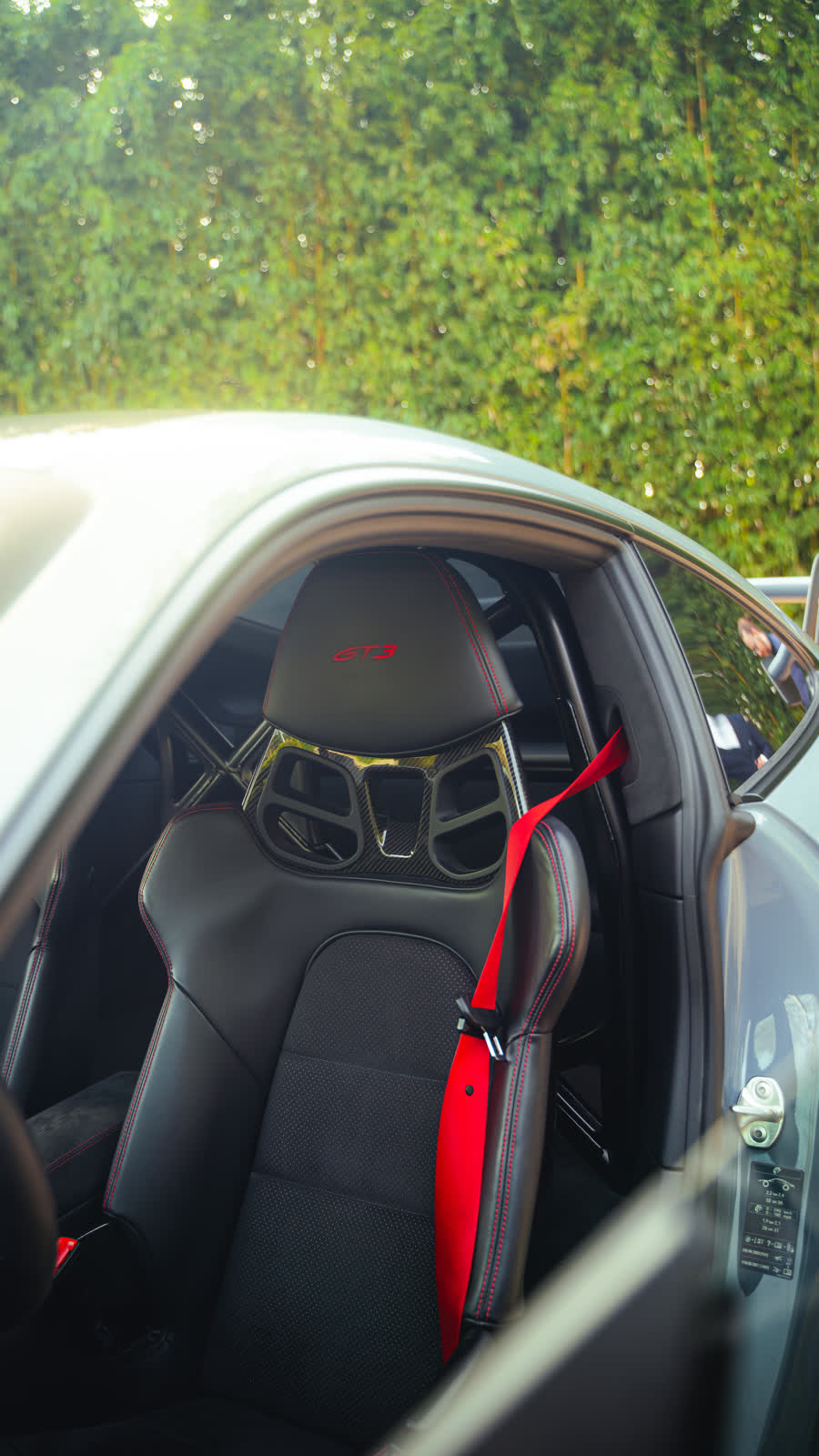Siège baquet de la Porsche 911 GT3, ceinture rouge